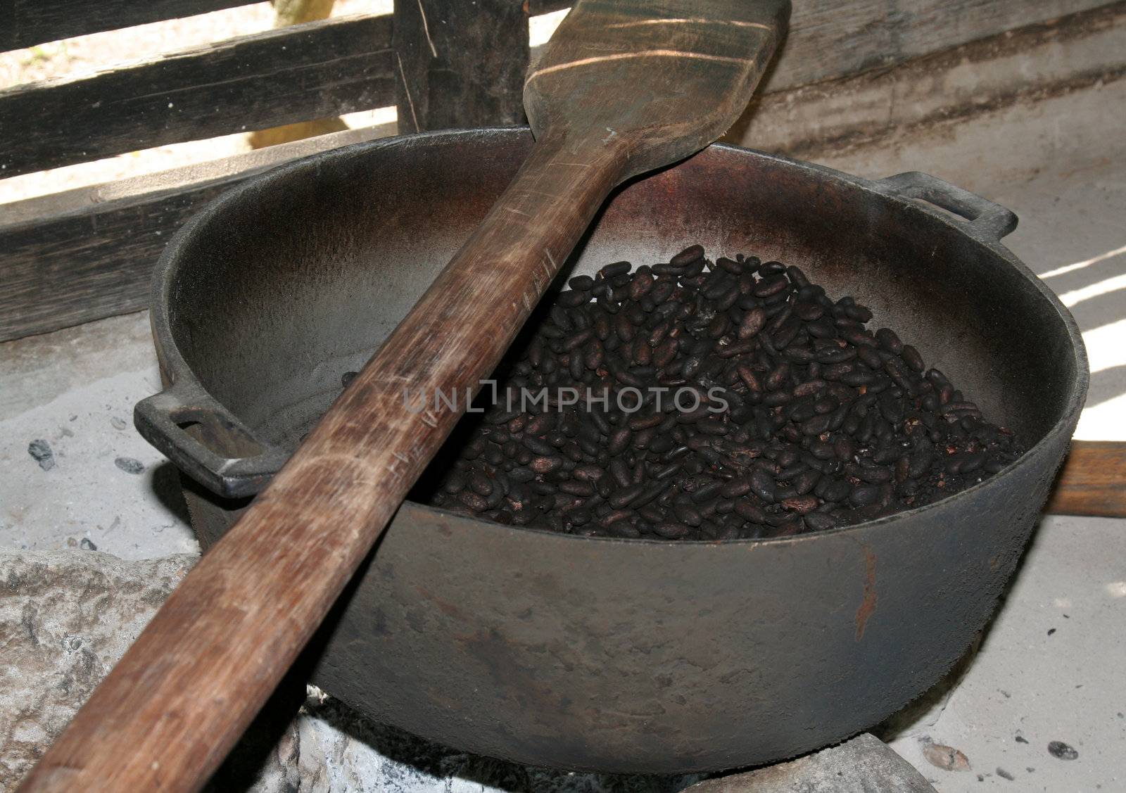 Roasted cocoa beans, still in the pot.
