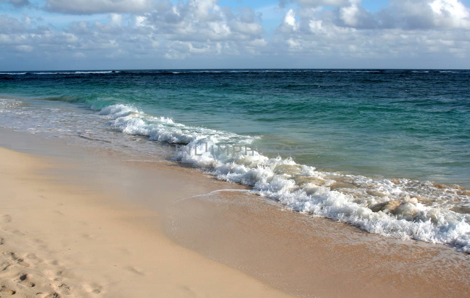 The beautiful beach of Punta Cana, Dominican Republic.  Shot a couple hours after dawn.
