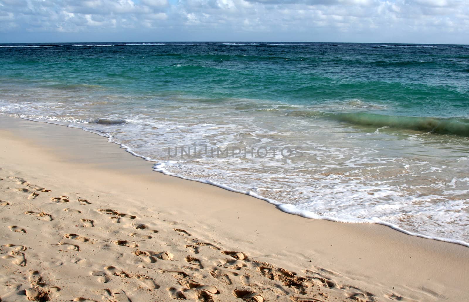 The beautiful beach of Punta Cana, Dominican Republic.  Shot a couple hours after dawn.