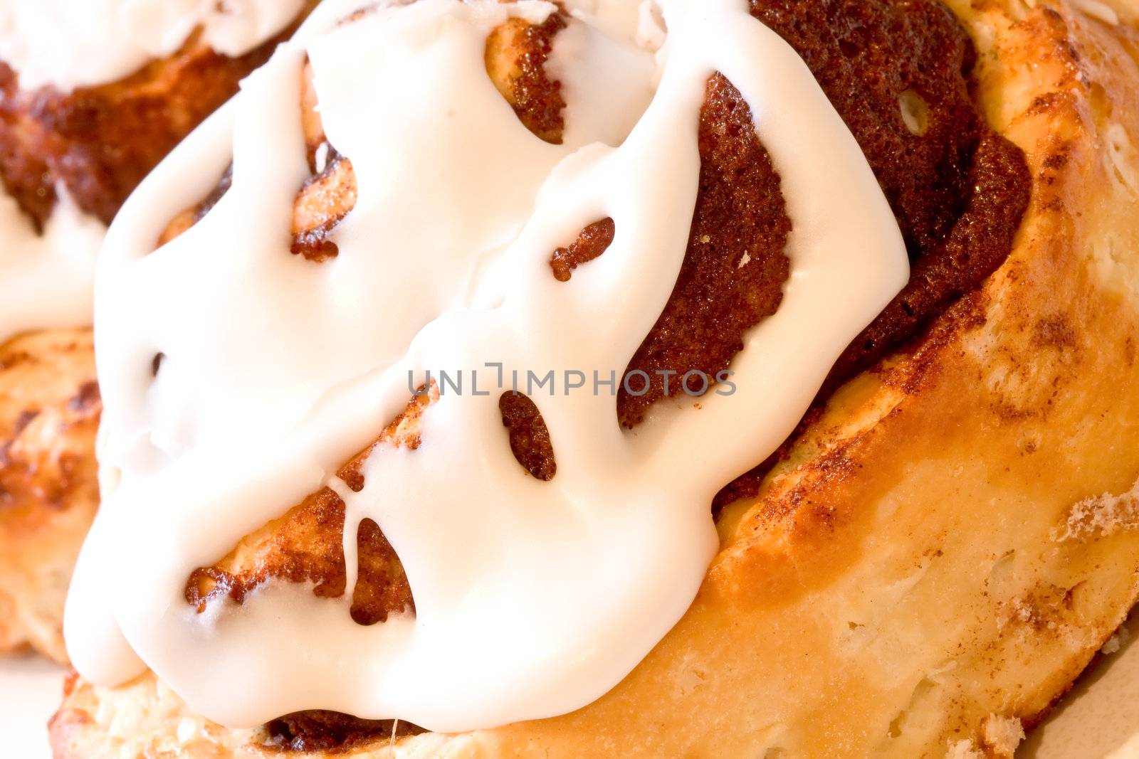 cinnamon rolls fresh and hot close up shot nice icing