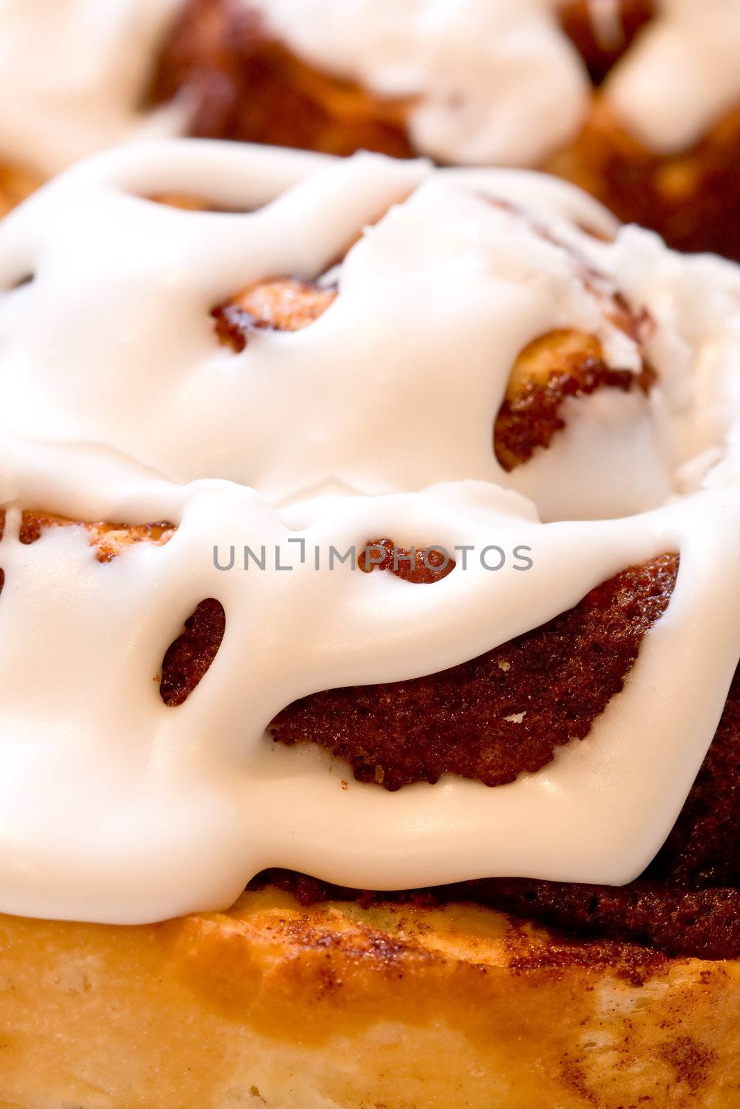 cinnamon rolls fresh and hot close up shot nice icing