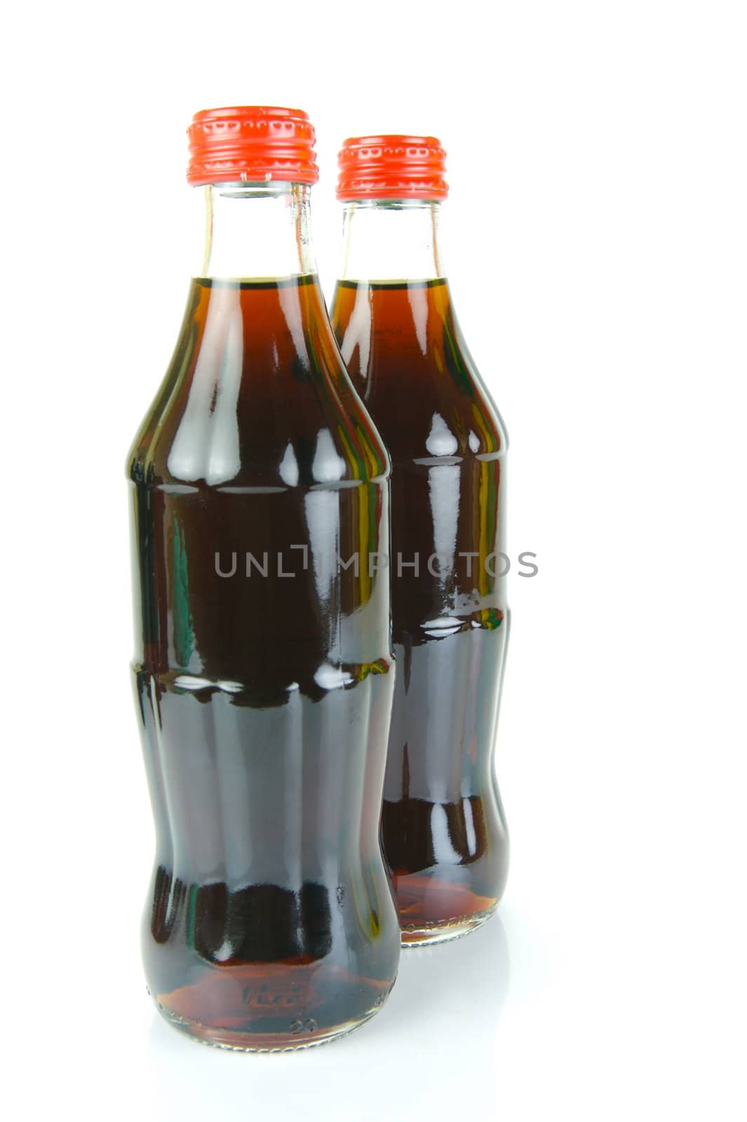 Cola bottles isolated against a white background