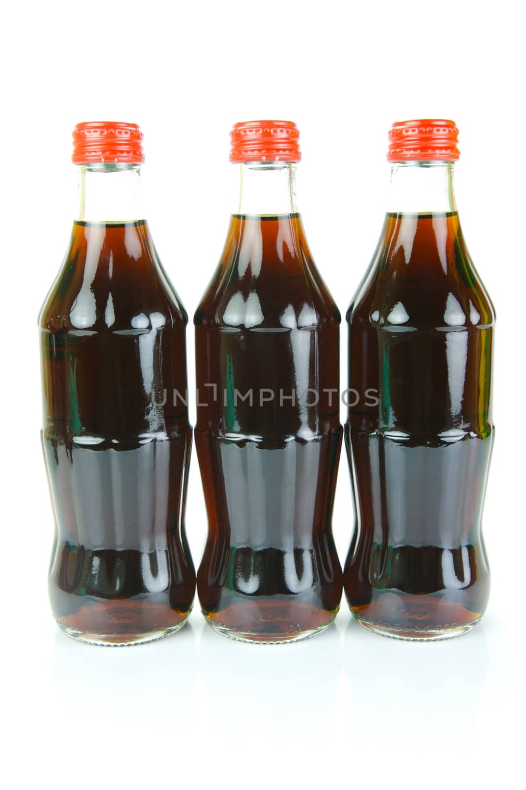 Cola bottles isolated against a white background
