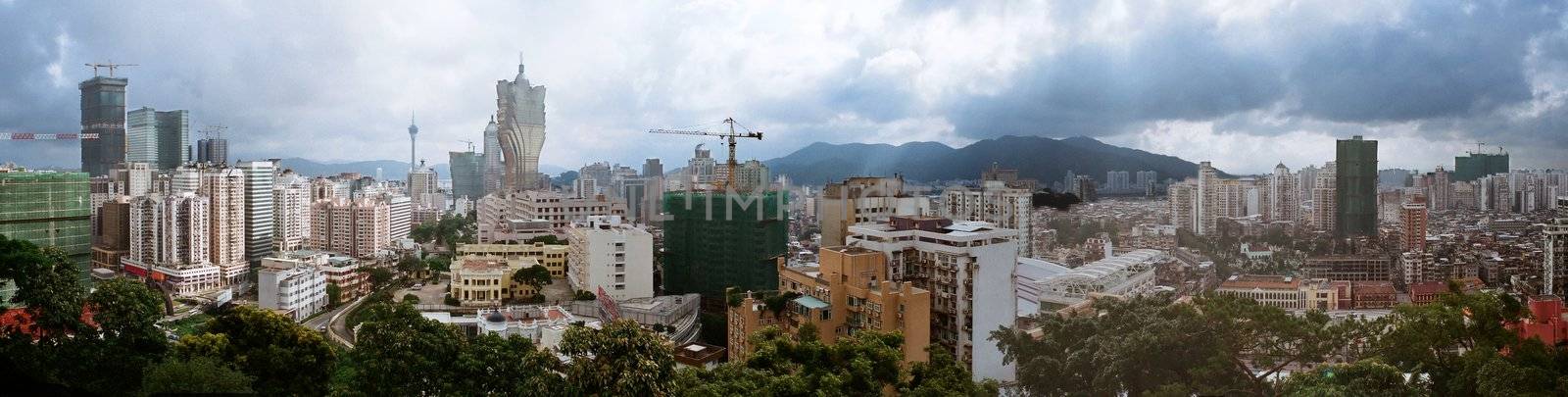 Macau skyline view from a peak,the development of asia's Las Vegas is in progress. The cloudy day makes a uncertain mood.