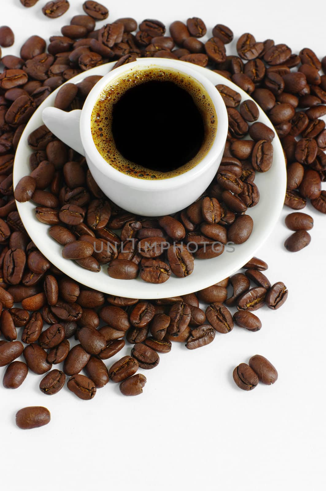 Coffee cup and grain on white

