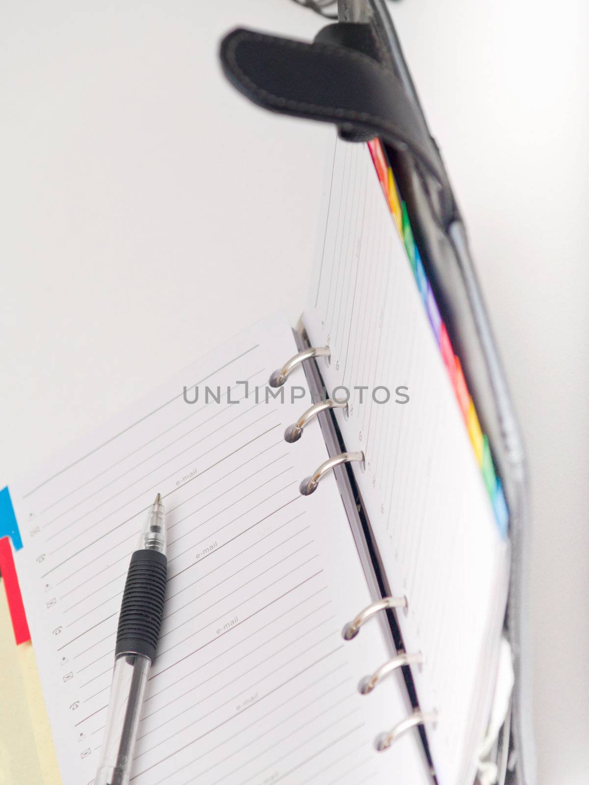 Office stationary - Pen and diary on white background