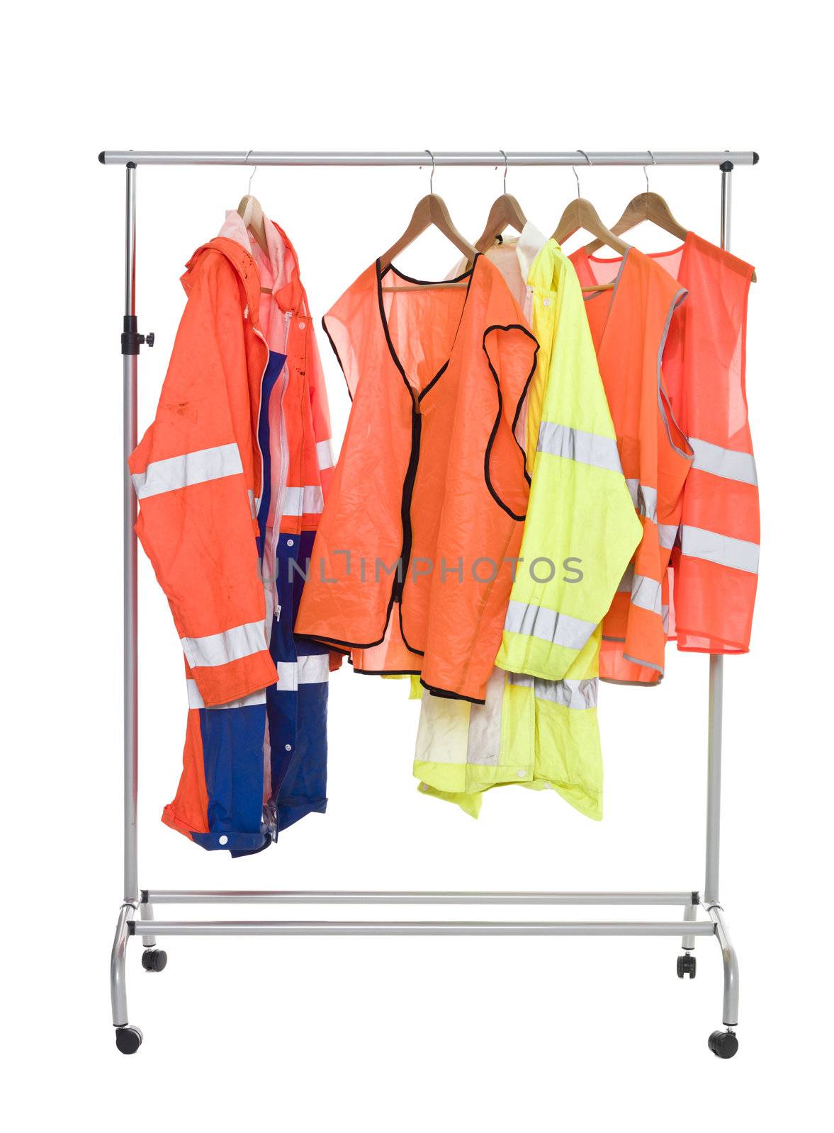 Colored Workwear hanging on a Clothes Rack isolated