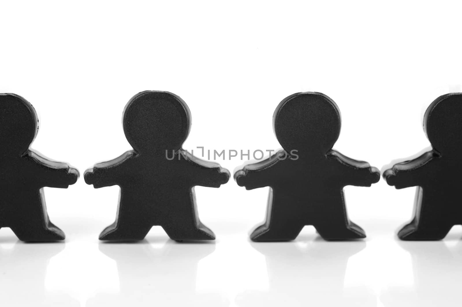 Miniature figurines isolated against a white background