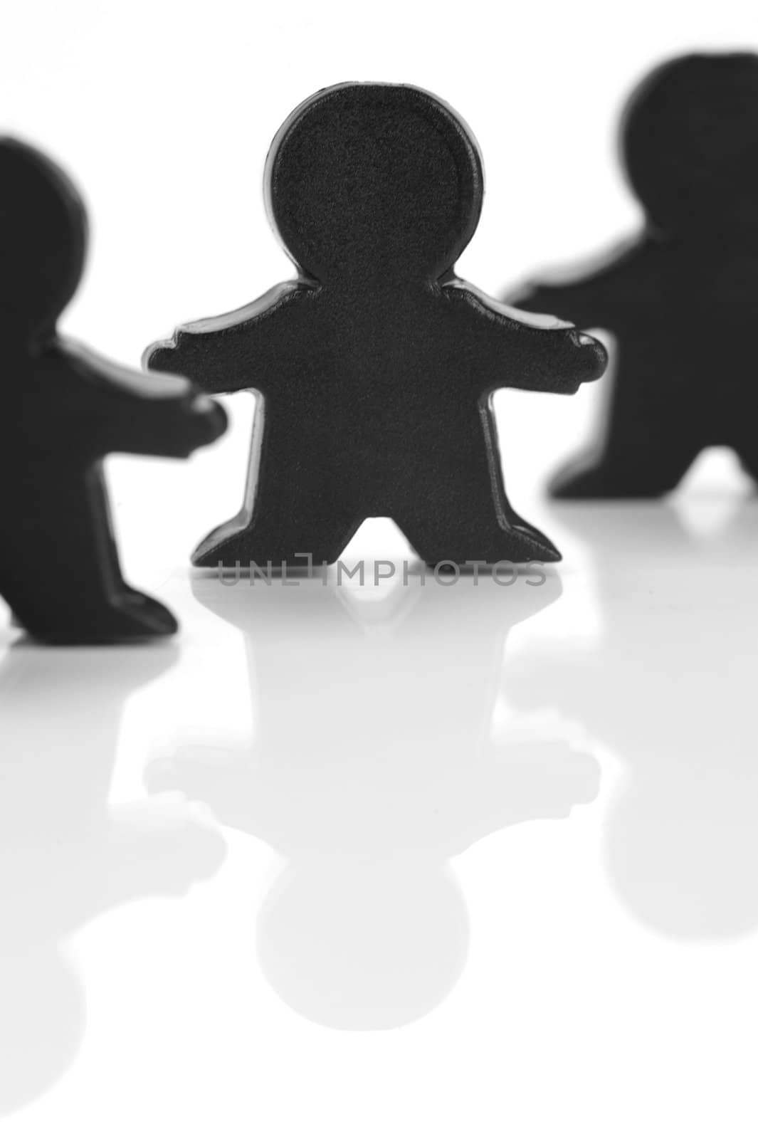 Miniature figurines isolated against a white background