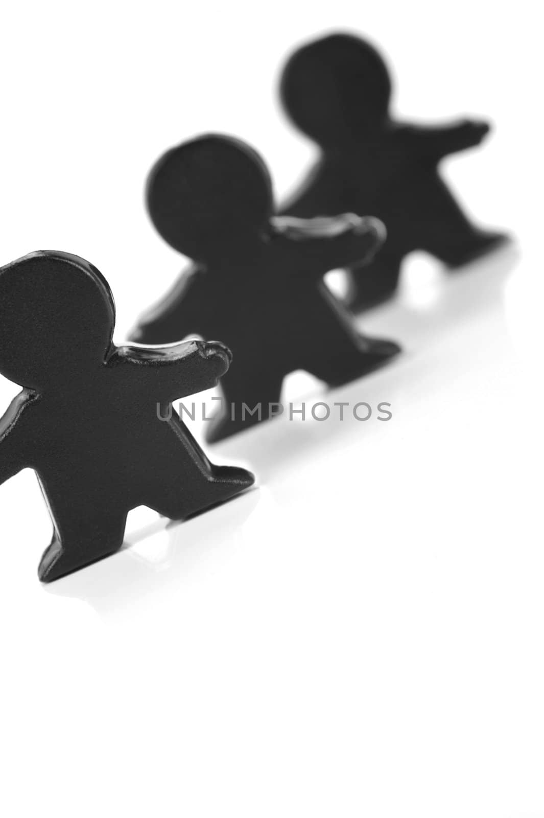 Miniature figurines isolated against a white background