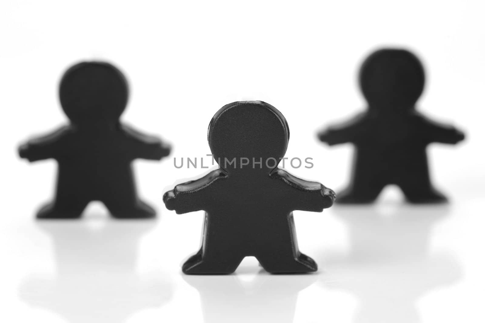 Miniature figurines isolated against a white background