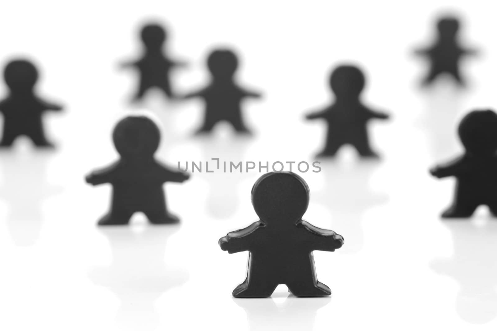 Miniature figurines isolated against a white background