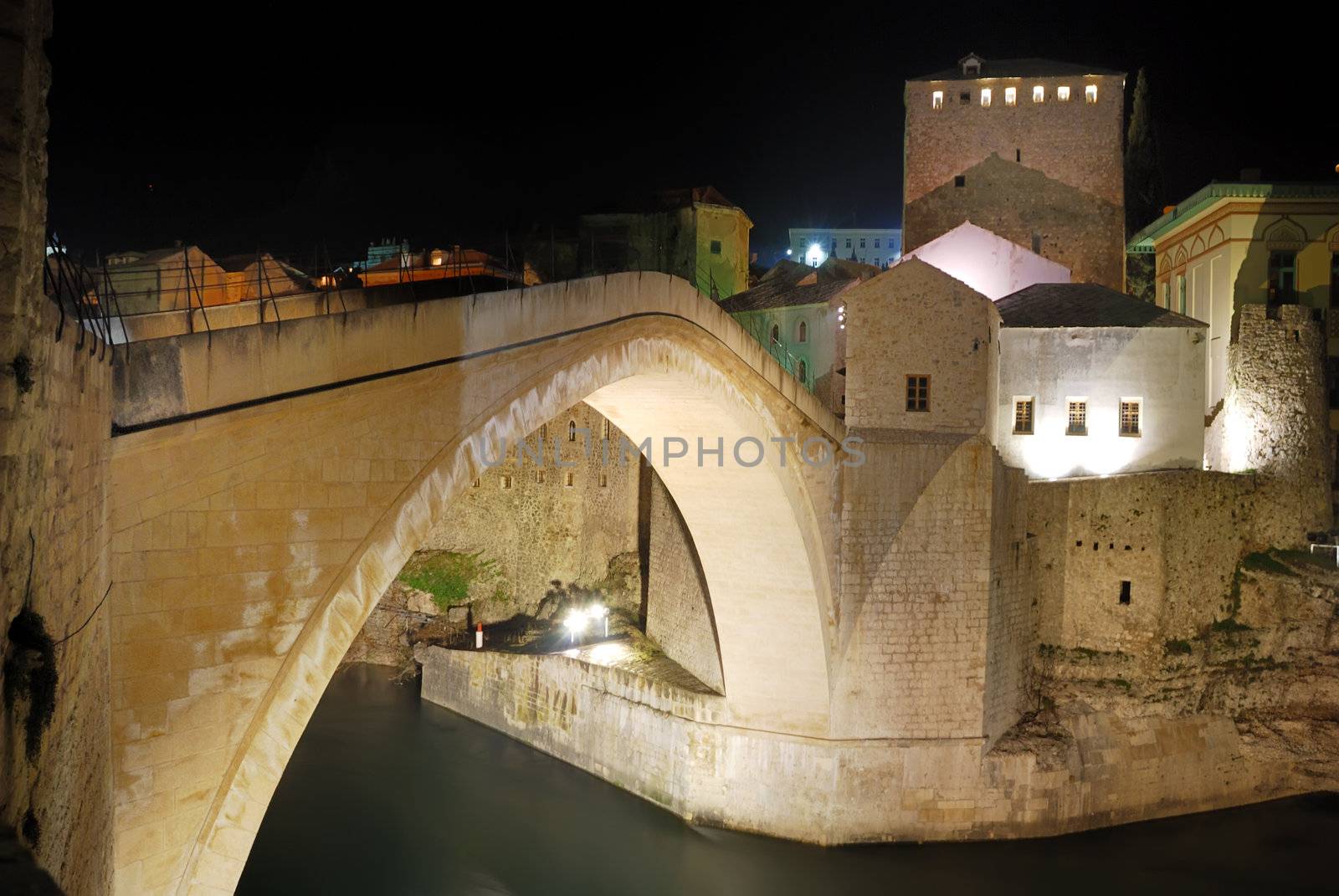 Old Bridge in Mostar at night reconstructed in 2003 after the original from 1556.