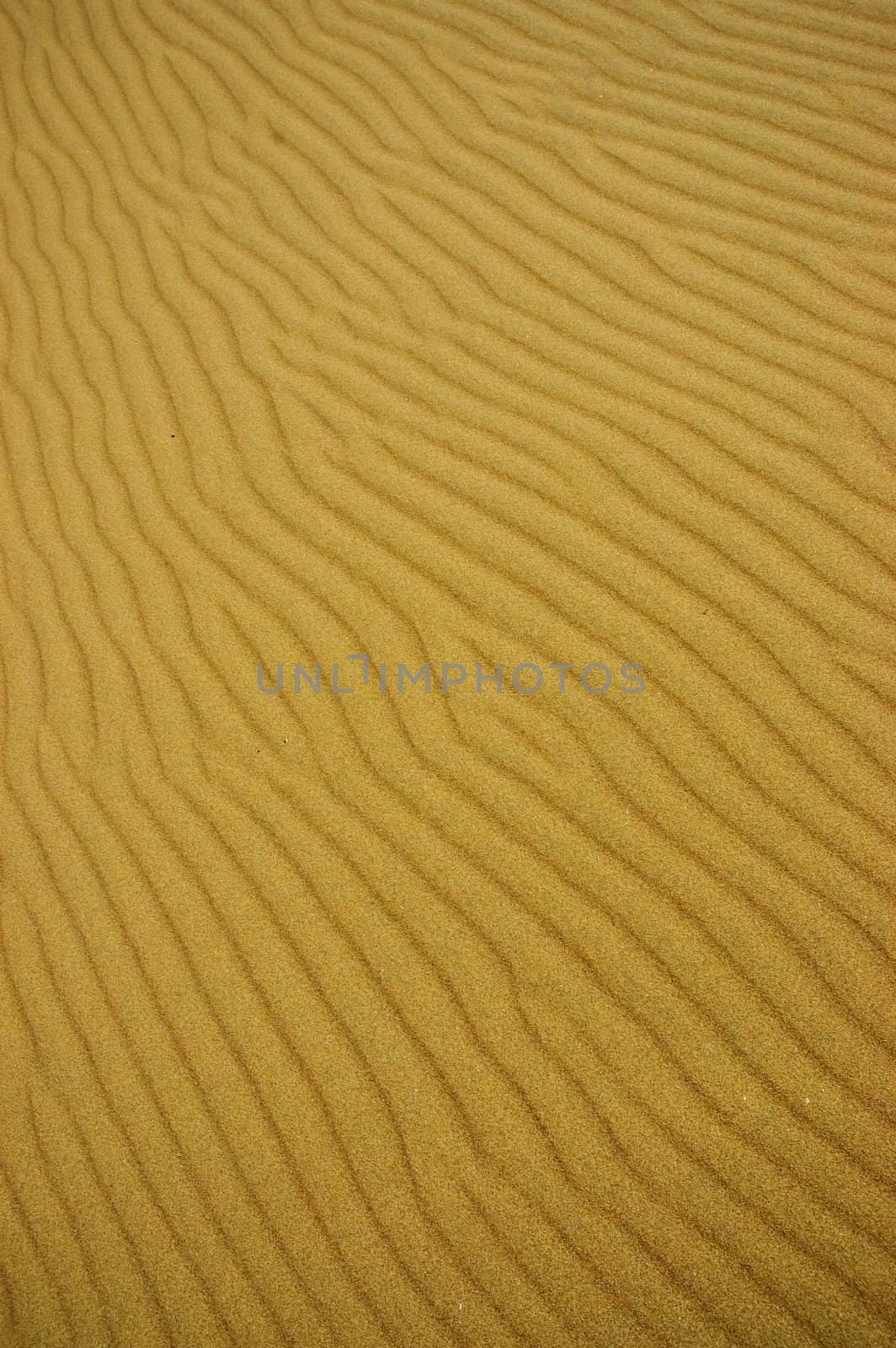Sand dune against the sky in Patagonia, Argentina.