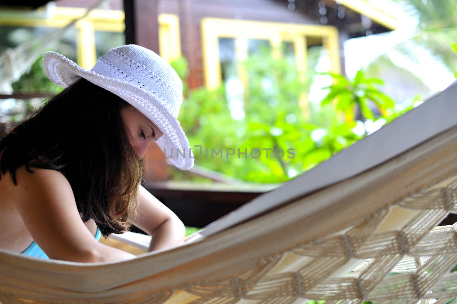 Woman relaxing in an hammock
