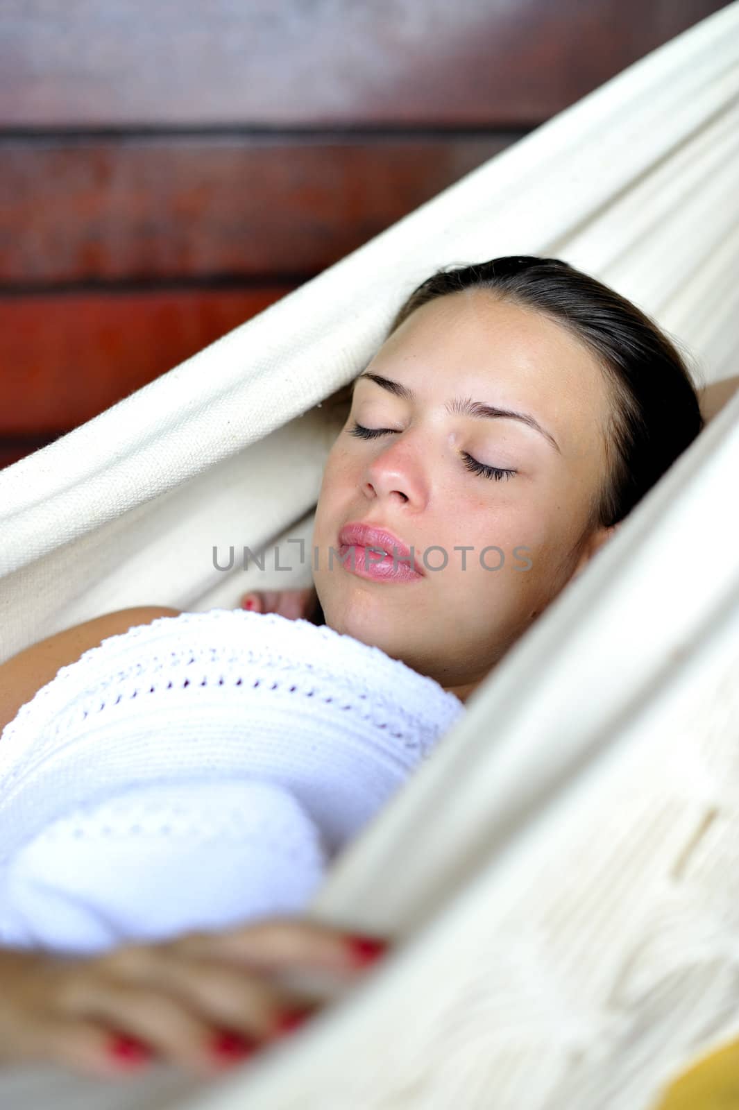 Woman relaxing in an hammock
