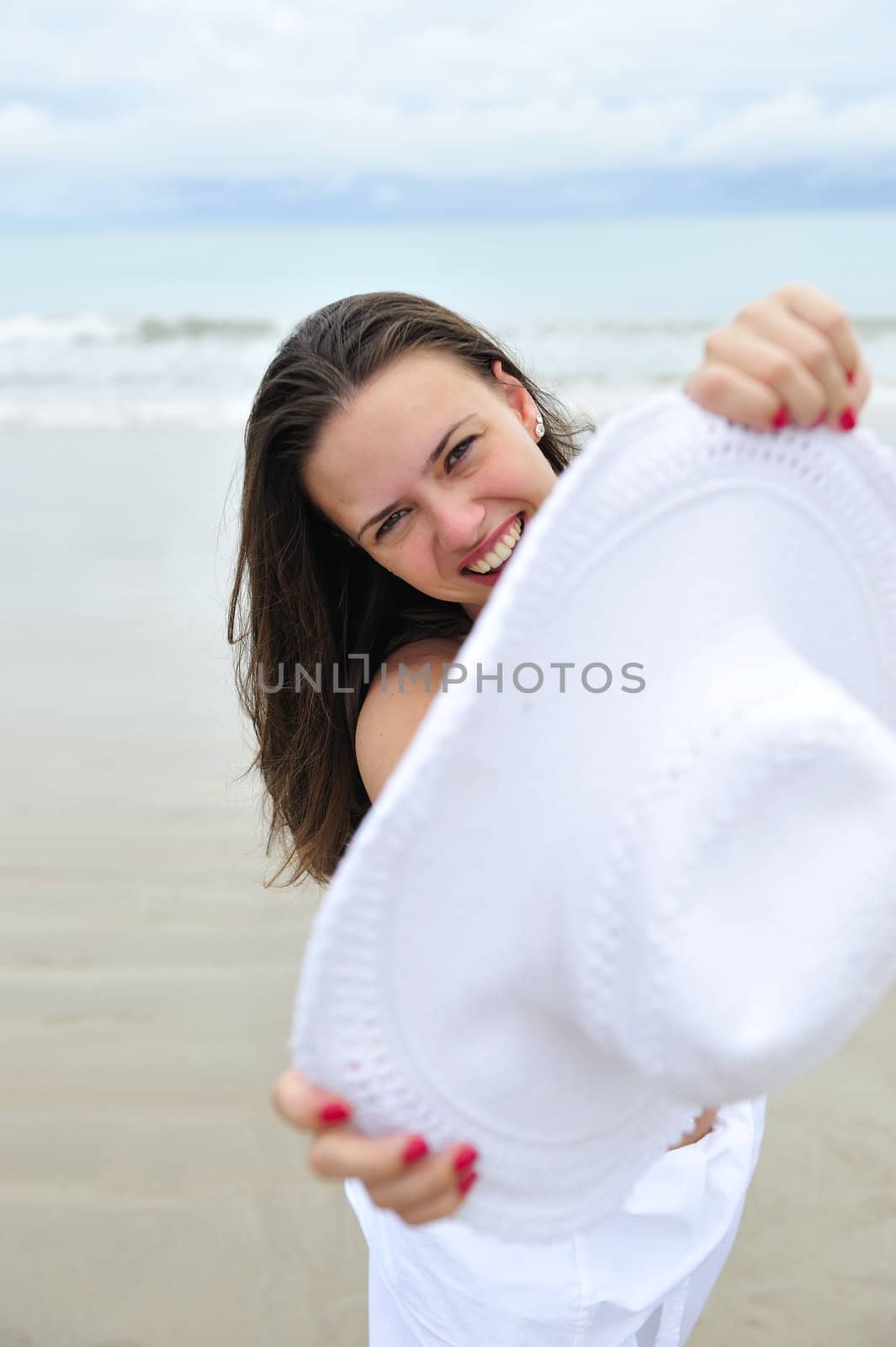 Woman enjoying her holiday in the beach in Brazil
