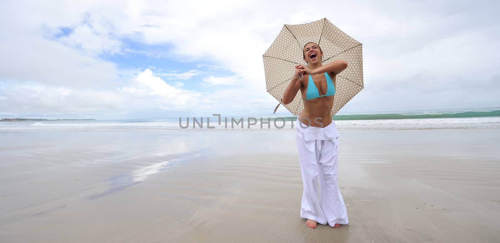 Woman enjoying her holiday in the beach in Brazil
