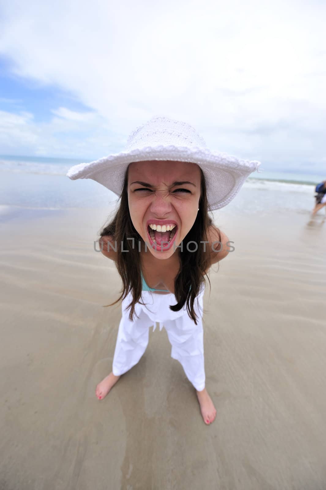 Woman enjoying her holiday in the beach in Brazil
