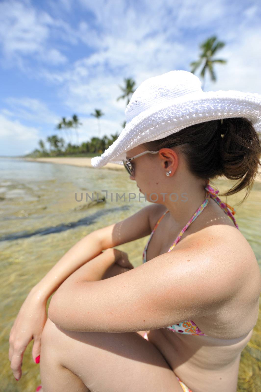 woman enjoying her holiday on a tropical beach in Brazil
