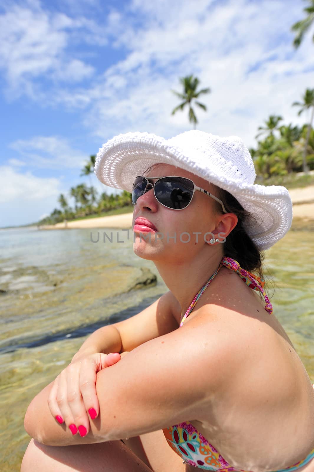 woman enjoying her holiday on a tropical beach in Brazil
