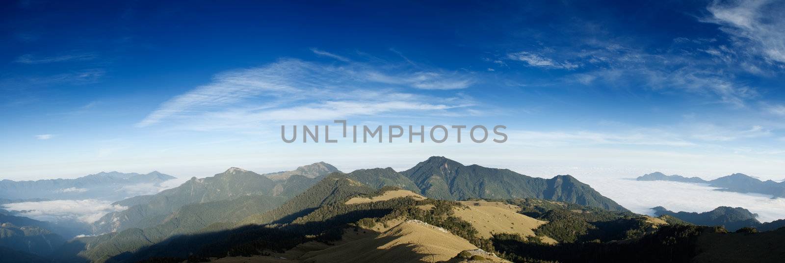 Beautiful panorama mountain landscape with blue sky. by elwynn