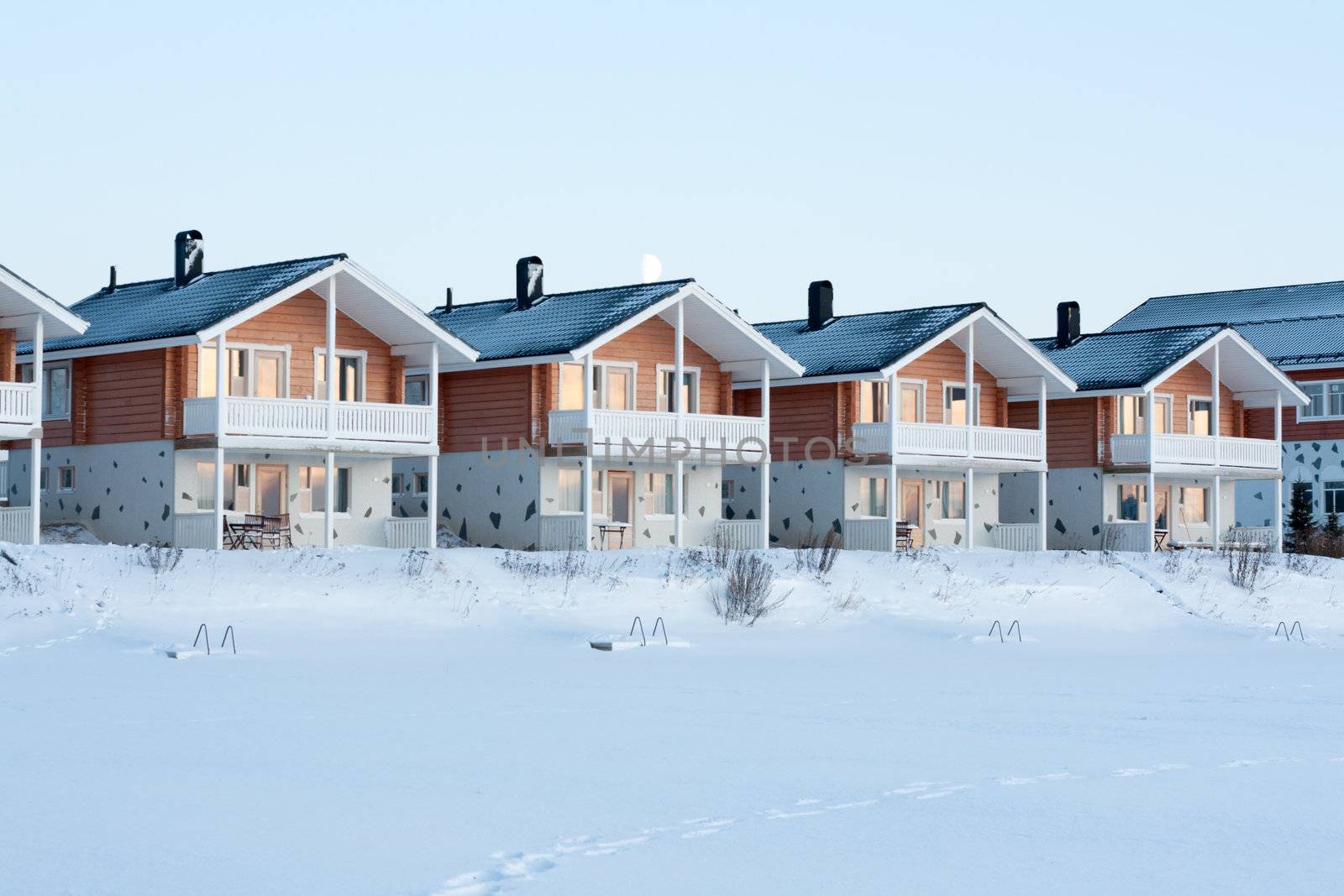 Lodges in snow, sundown, moon, winter, sky