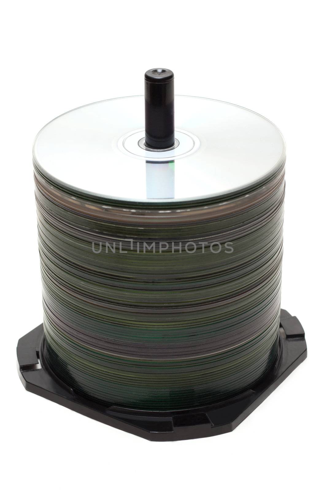 Pile CD disk on spindel insulated on white background