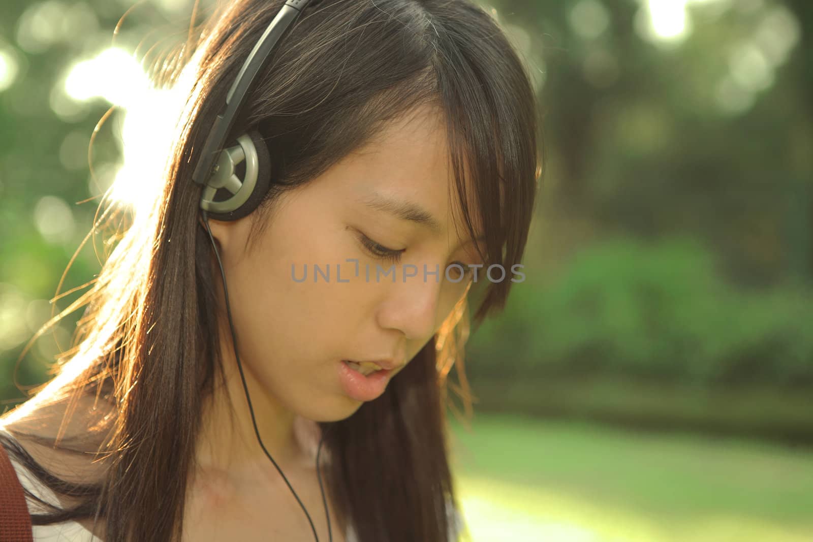 girl enjoy music with headphones