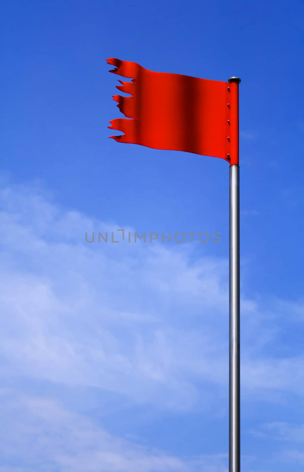 Metal red flag against the blue sky