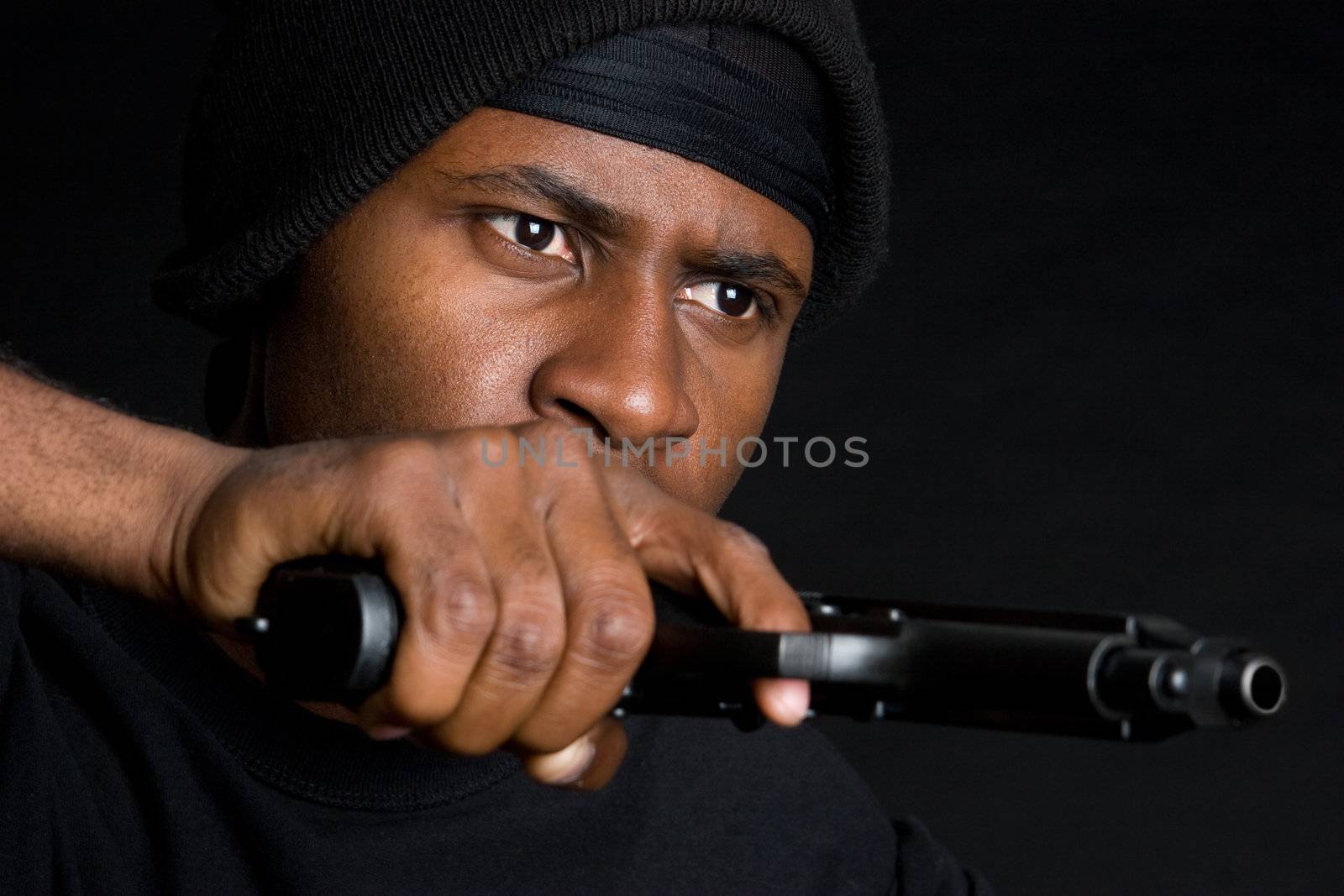 African american man pointing gun