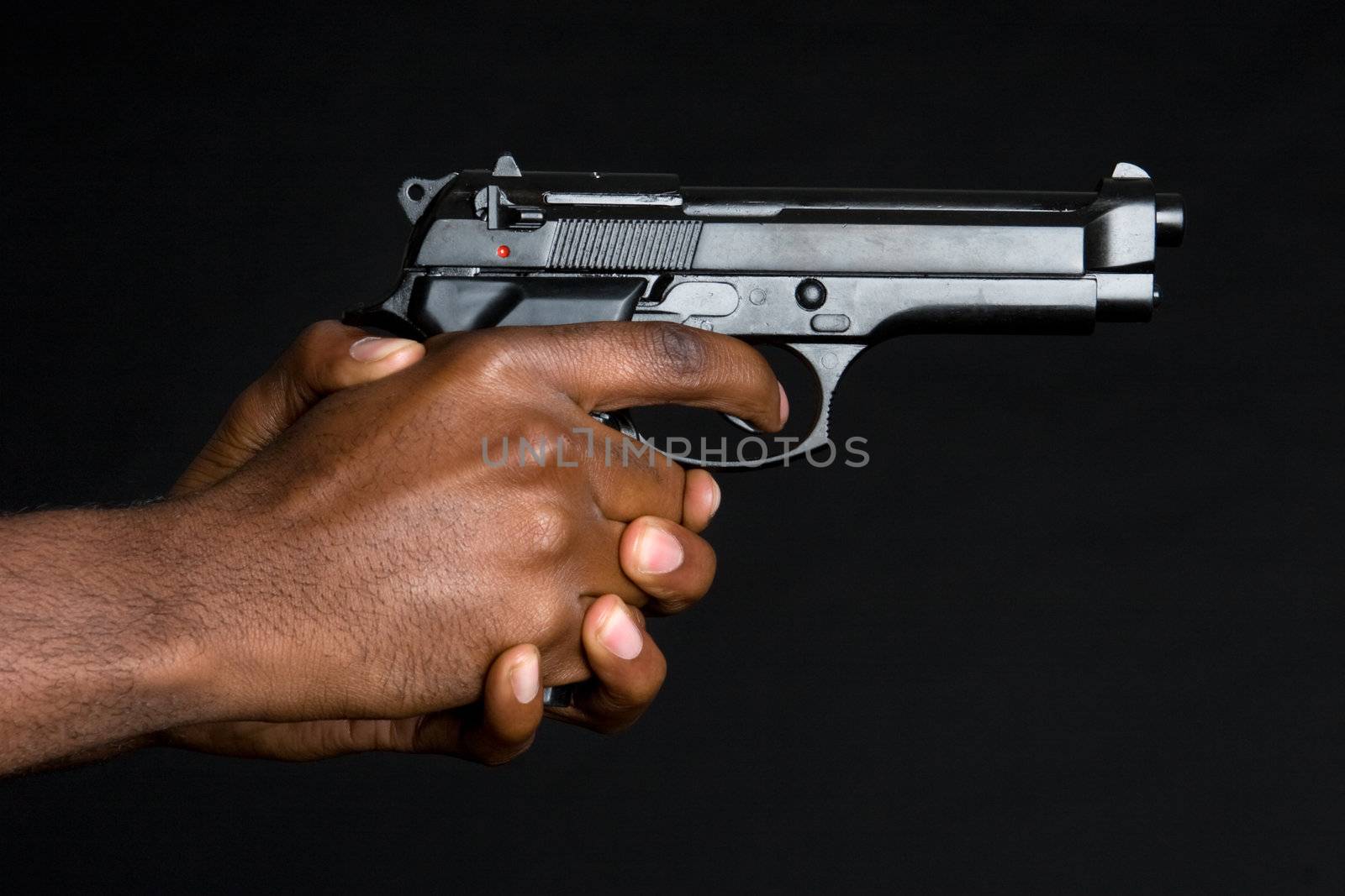 Man holding gun in hands