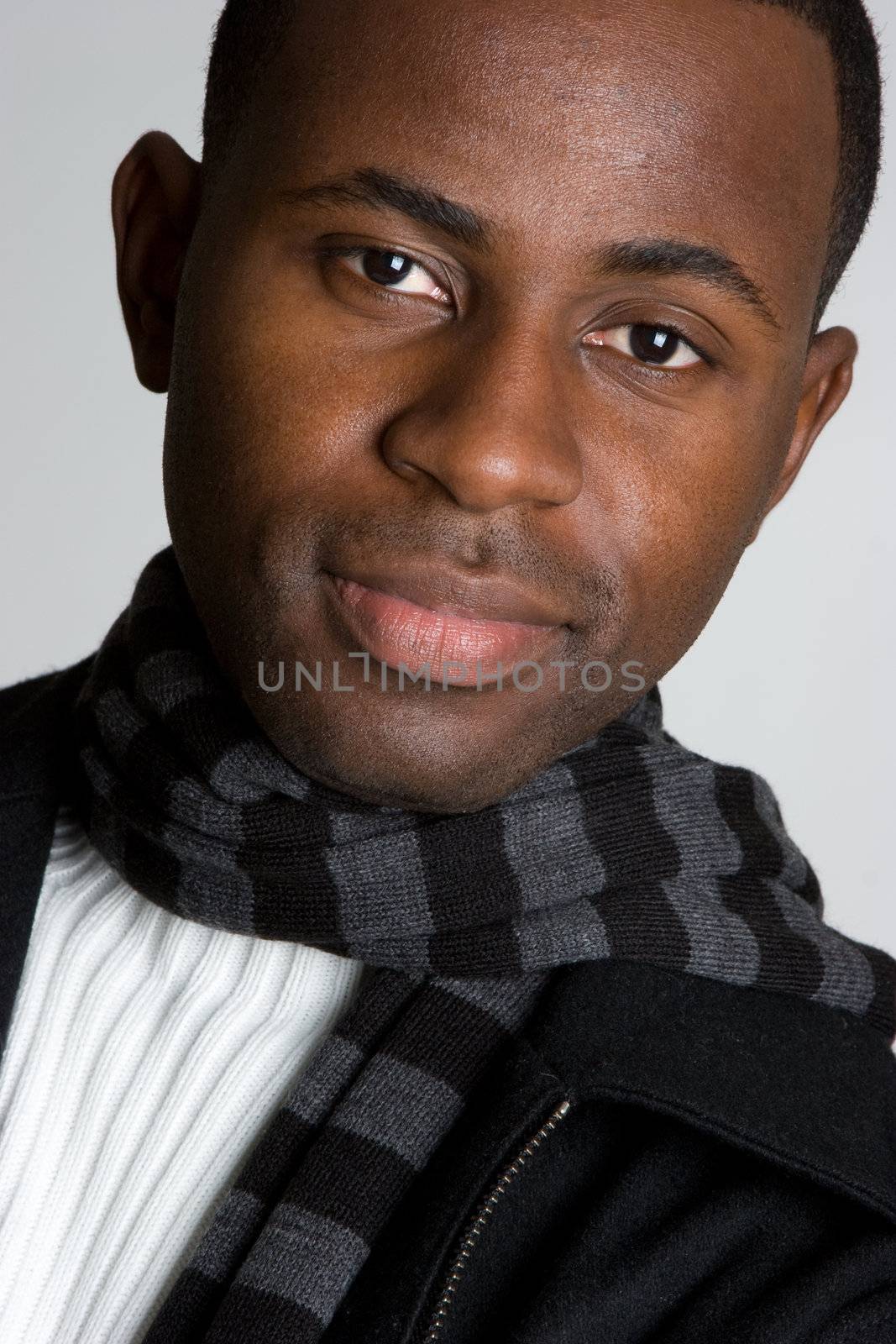 Handsome smiling young black man