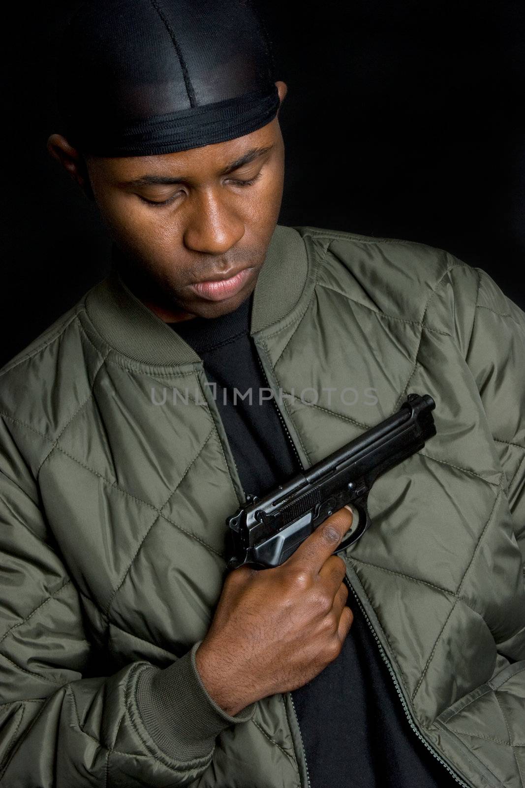 African american man holding gun