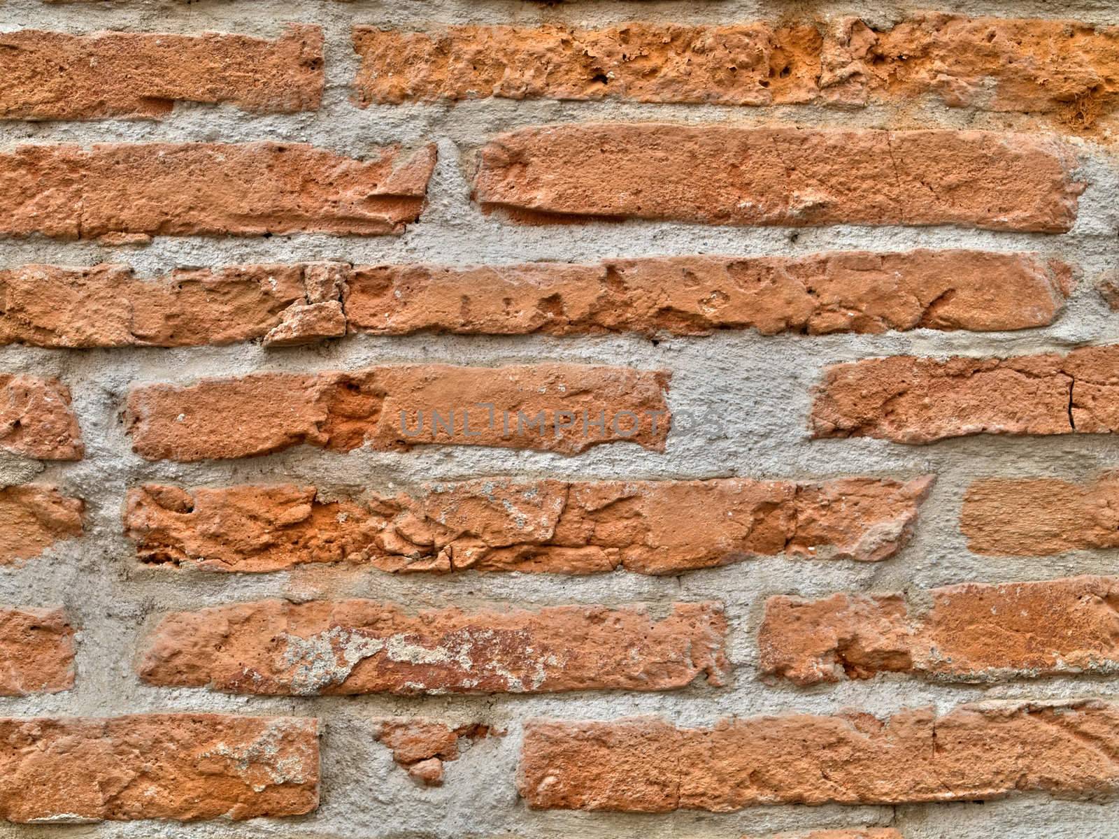 Red brick wall in the city of Toulouse France