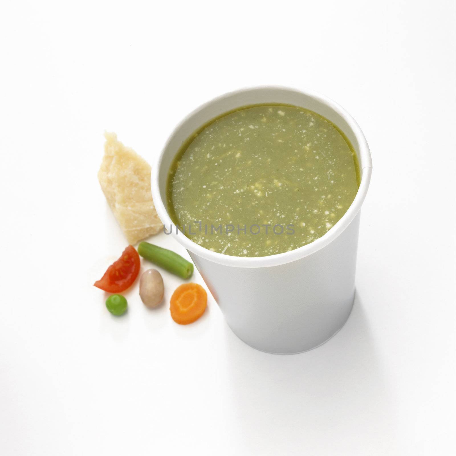 Cup of soup isolated on white