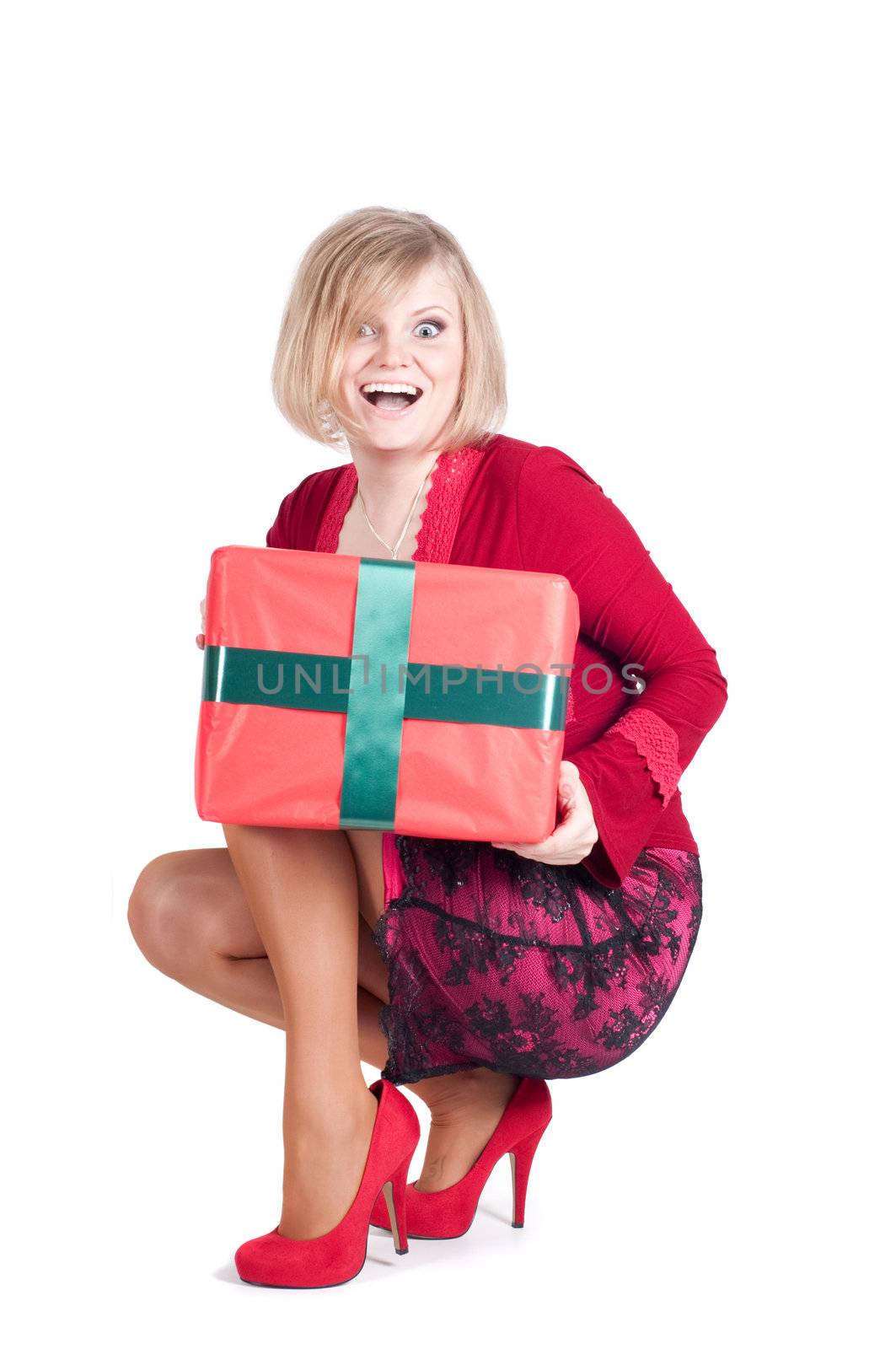 Happy woman with Christmas presents isolated on white