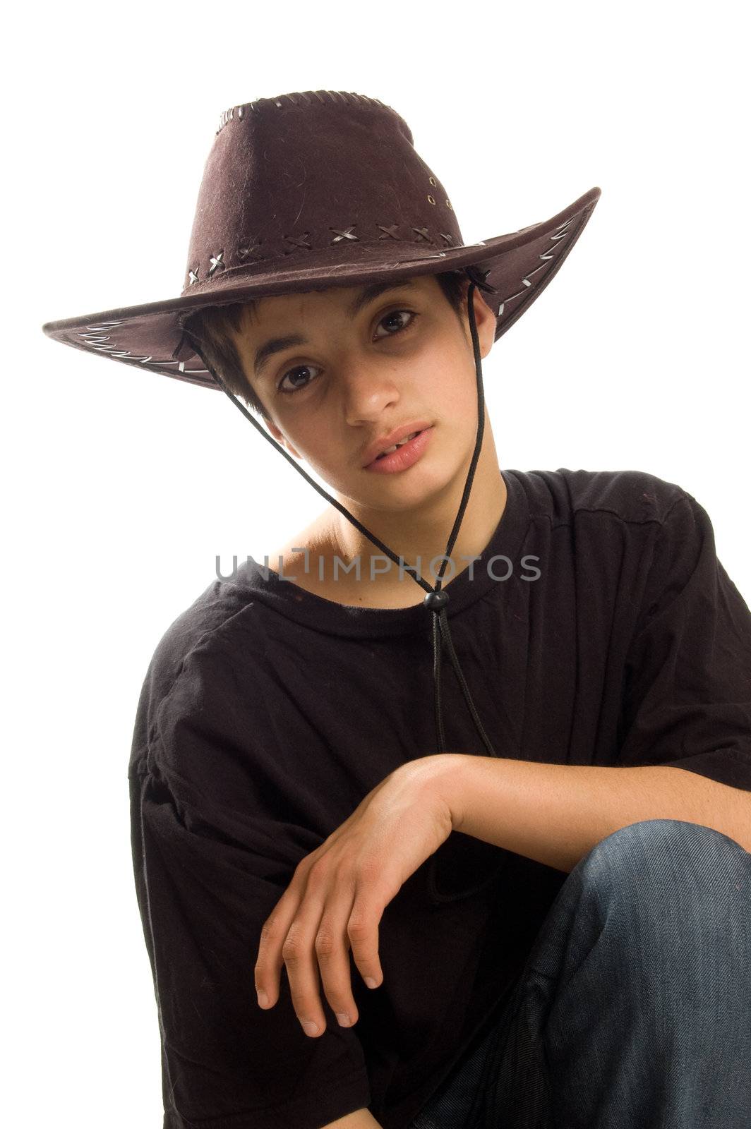 teenage boy wearing an original american leather cowboy hat  on white