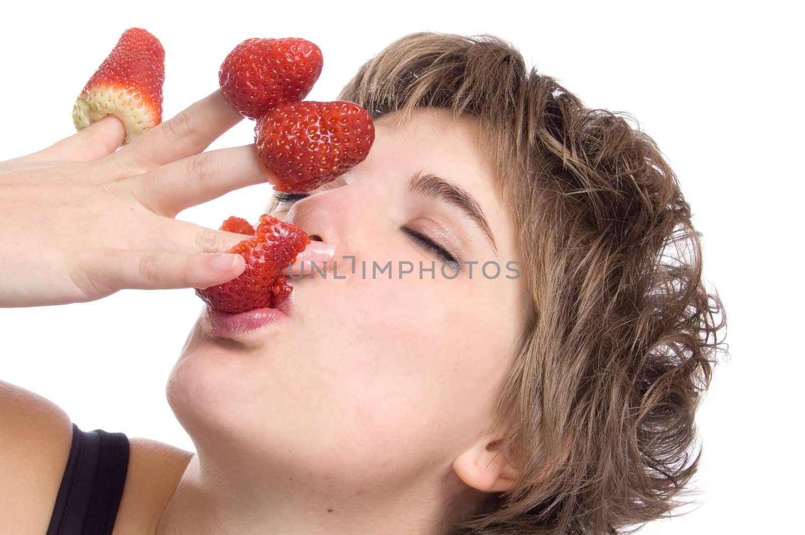 Sexy girl with red strawberry isolated on white background by ladyminnie
