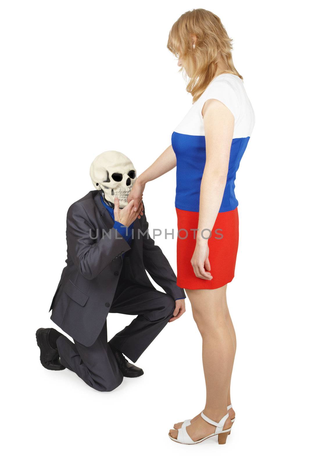 The skeleton kisses a hand to the young woman