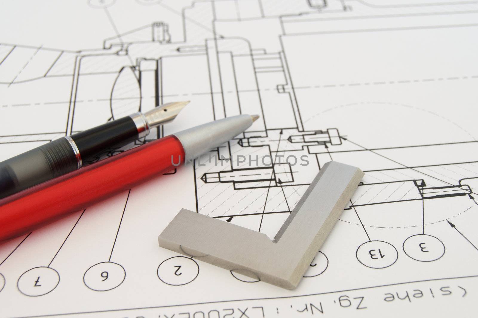 Protraktor on technical drawing with pen.