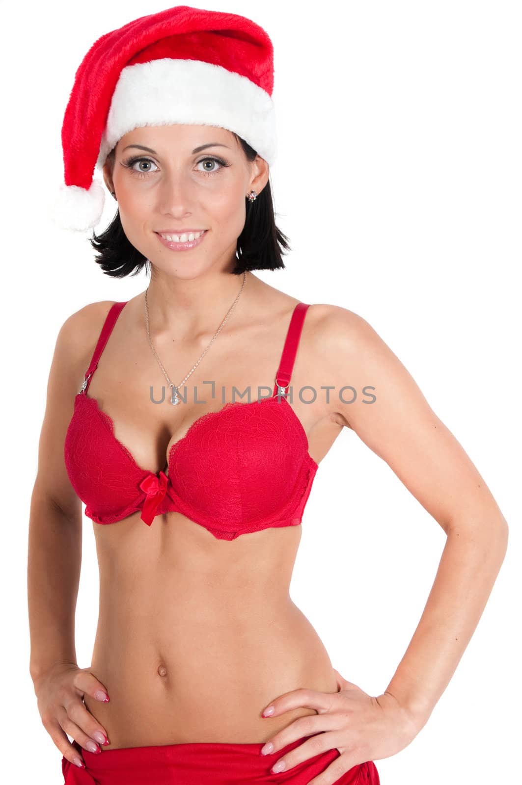 Portrait of beautiful woman in red santa hatisolated on white