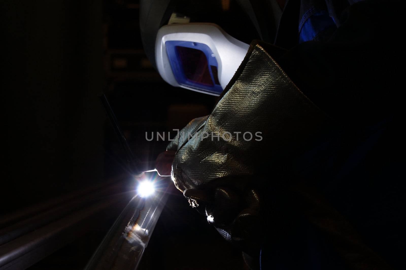 TIG welders working at the factory.