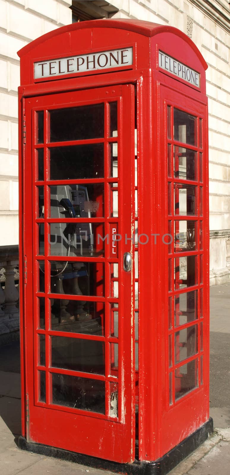 Traditional Red Telephone Box in London, UK
