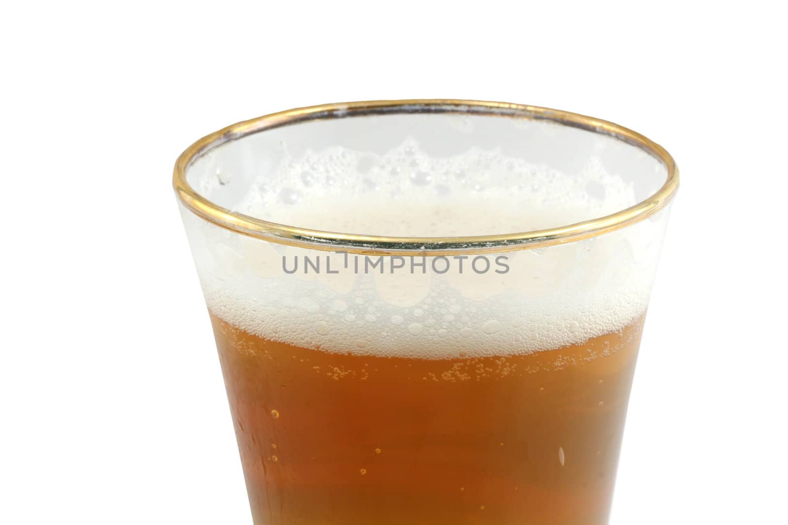 A isolated pilsner glass of beer