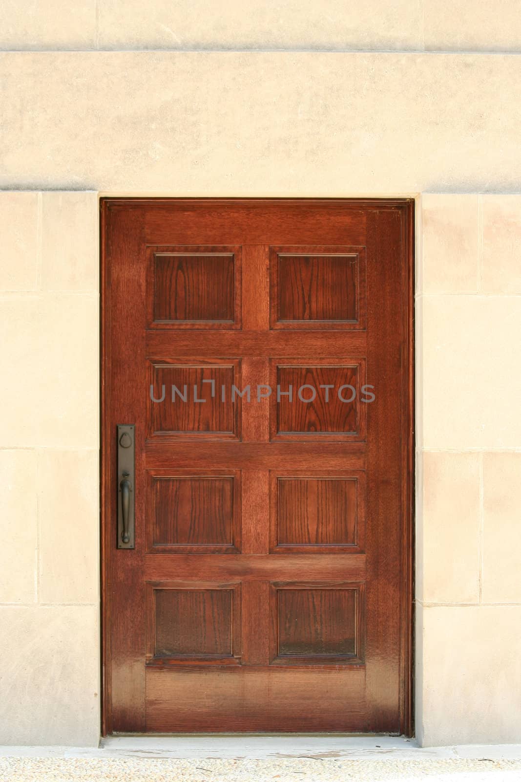 A old wooden door surrounded by cement blocks