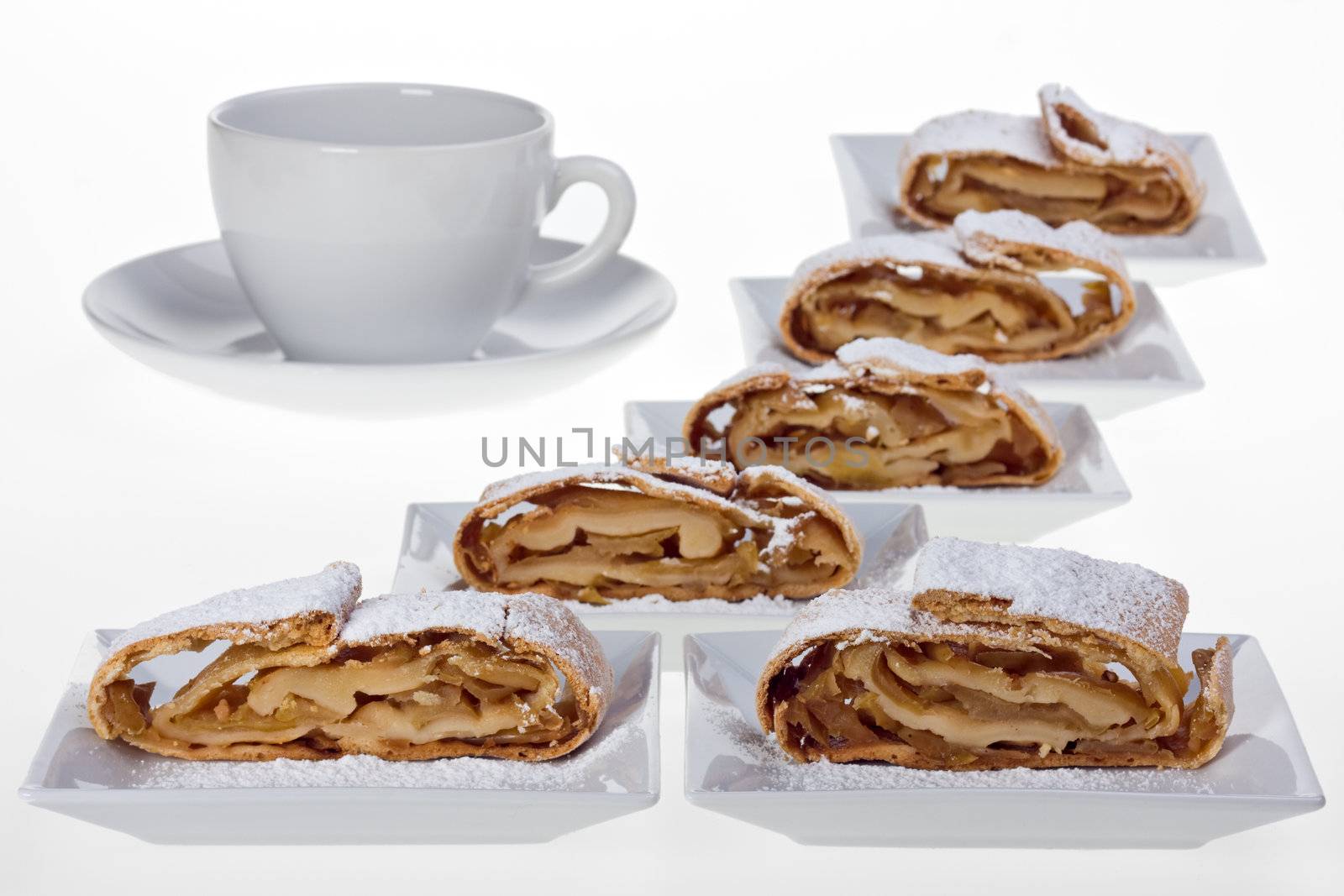 detail of an apple strudel with icing sugar