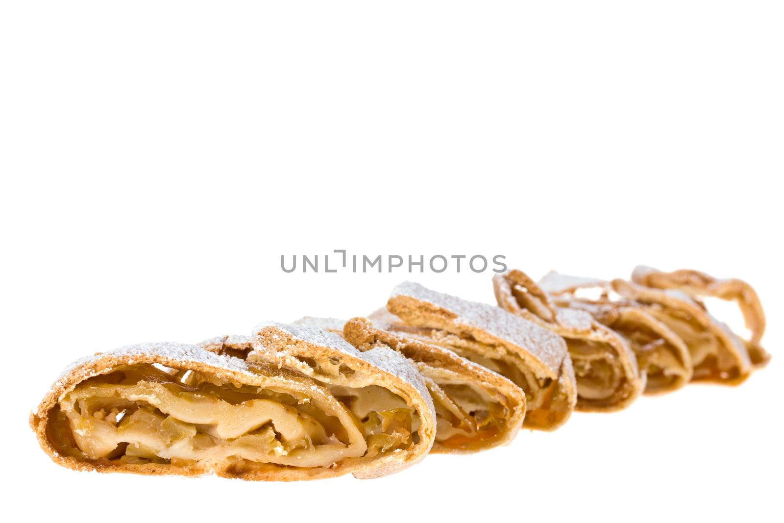 detail of an apple strudel with icing sugar