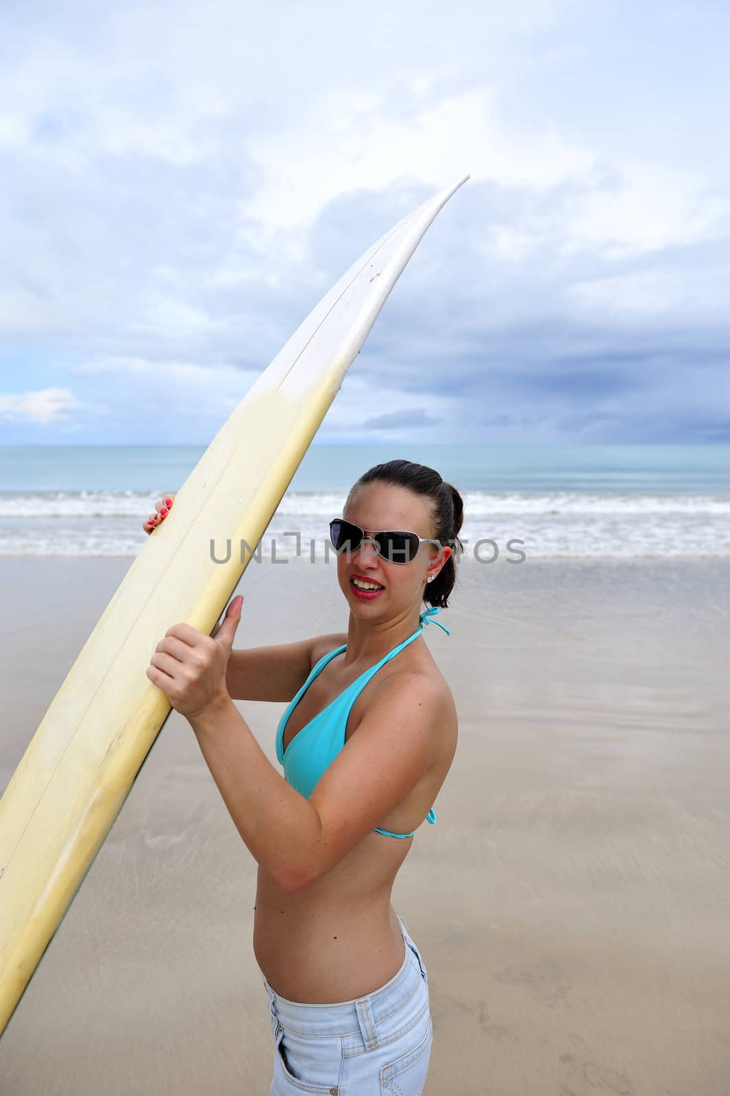 Surfer on the beach in Brazil