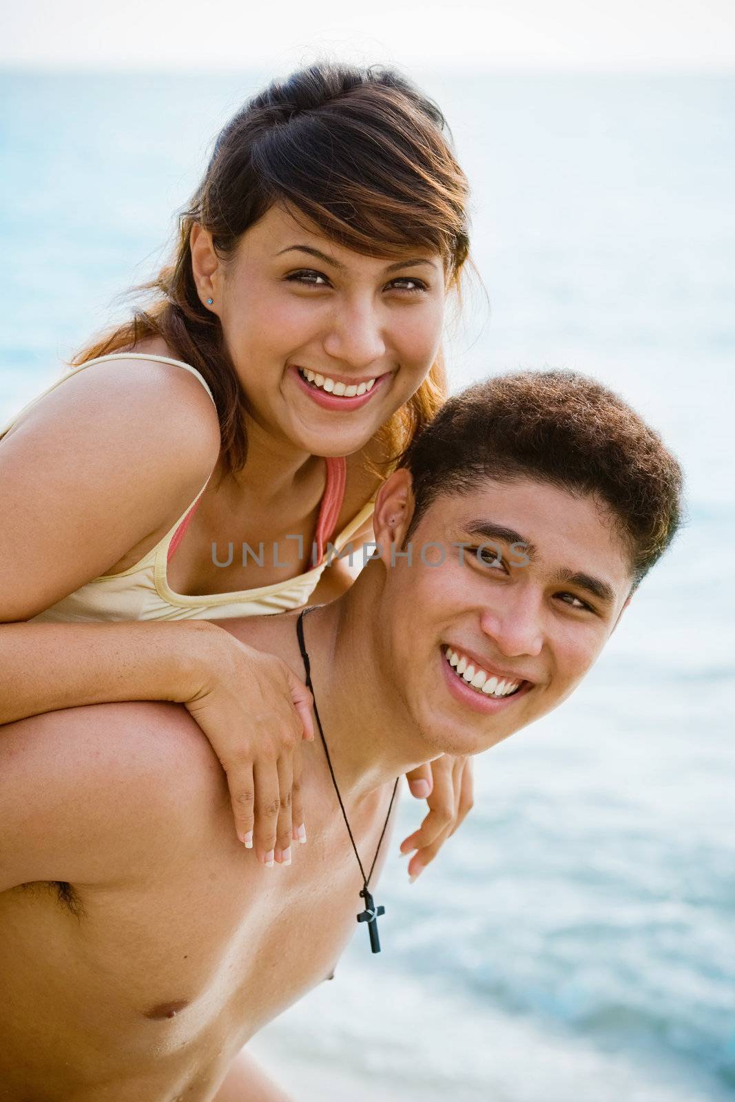 happy couple by the beach by eyedear